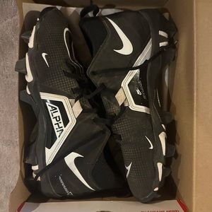Boys Nike football cleats black and white